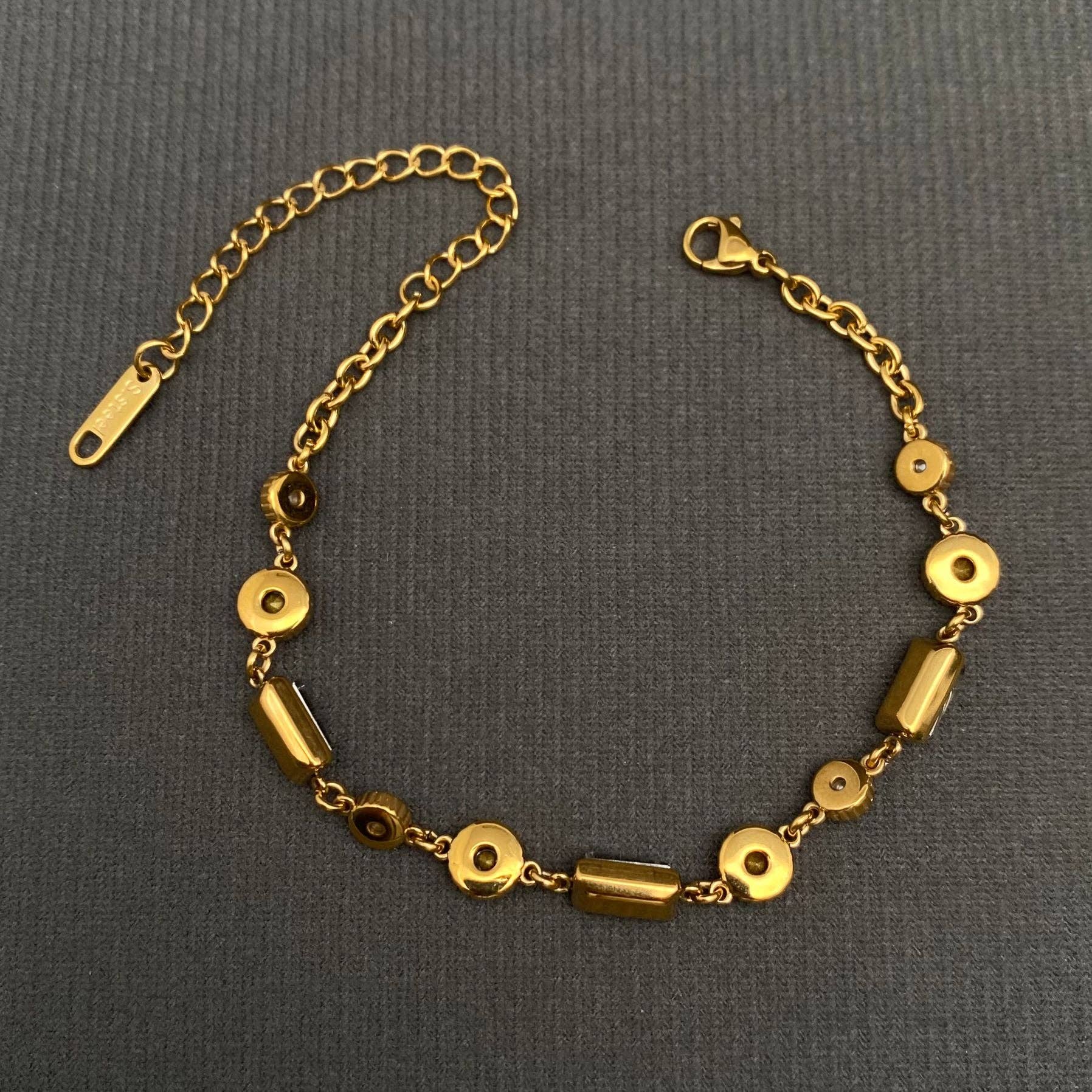 White Zircon Inlaid 18K Gold Plated S.Steel Bracelet -FGS